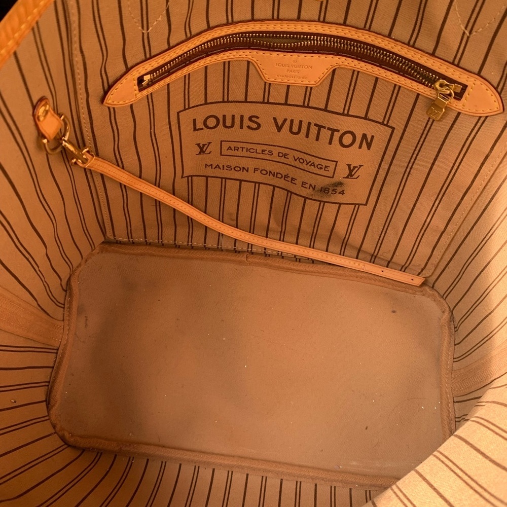 slightly used never full Louis Vutton purse